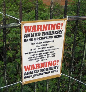 Armed robbery gang warning sign